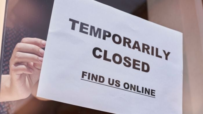 store sign temporarily closed